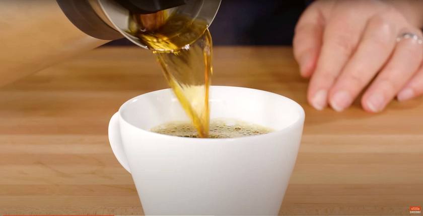 pouring coffee in a cup